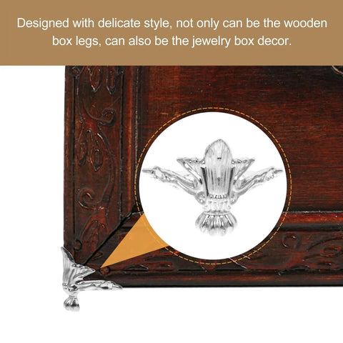 Close-up of silver zinc alloy decorative furniture leg on wood, 20 Piece Silver Zinc Alloy Decorative Furniture Leg Set For Jewelry Boxes And Wooden Cases With Screws Retro Style Easy To Install Durable Metal Feet For Wood Case Corner Protection.