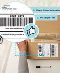Person applying 500 Count Fanfold 4x6 Thermal Labels With Perforated Line to a cardboard box, showing barcode and clear print.