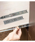 Hand installing Drawer Slide Rail System In Stainless Steel Side Mount Ball Bearing Slides 2 Pack Heavy Duty Smooth Silent Glide Snap On