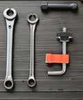 Grab These Sweet 12 Pc Right Angle Clamps For Stone Wood Slabs And Granite To Nail Perfect Masonry Joints Seam Alignment Precise Corner Workholding Like A Total Boss, assorted tools on a wooden surface.