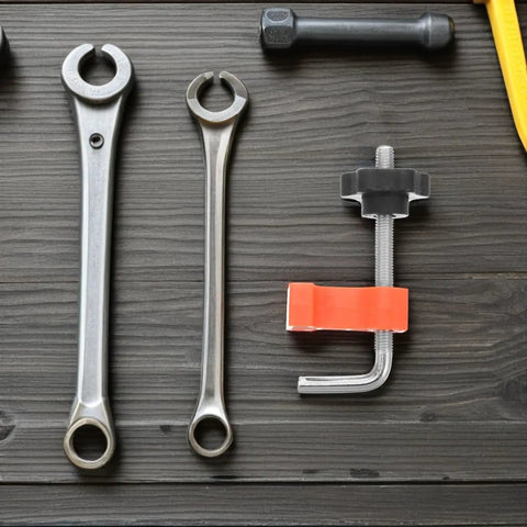 Grab These Sweet 12 Pc Right Angle Clamps For Stone Wood Slabs And Granite To Nail Perfect Masonry Joints Seam Alignment Precise Corner Workholding Like A Total Boss, assorted tools on a wooden surface.