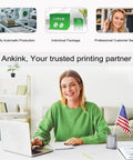Woman working on a laptop at a desk with USA flag, green packaging, printing partner text, and customer service professional visible.