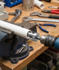Shuielai 3 Piece Pipe Threading Tool Kit With Electric Drill Compatible dual function cutter on PVC pipe in workshop.