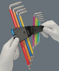Hex Key Set With Holding Function 9 Piece Multicolor L Keys Ice Hardened Stainless Steel With Handy Clip Storage in hands