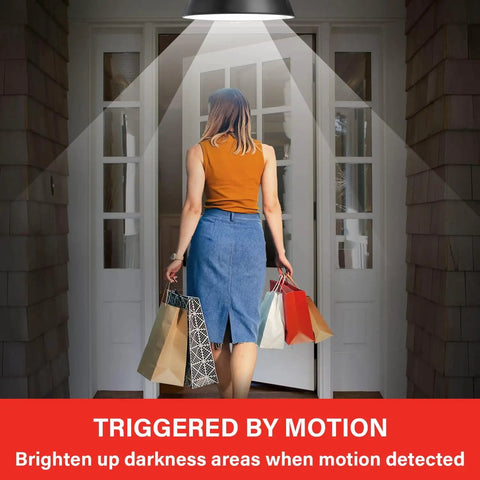 Motion Sensor LED Bulbs A19 5000K Daylight Dusk To Dawn Motion Activated 11W 75W Equivalent 1200 Lumens Indoor Outdoor Use Easy Install Porch Garage Hallway 2 Pack, woman at lit front door