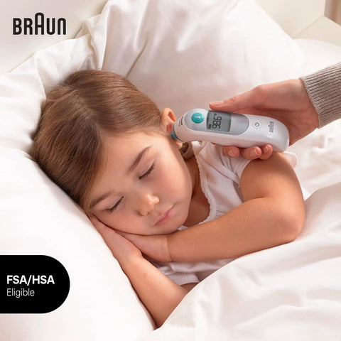 Digital Ear Thermometer With Easy Read Display For Kids And Adults, Fast Accurate Readings, Includes 2 AA Batteries, Protective Cap, And 21 Hygiene Caps For The Whole Family, Keeps Lens Clean For Reliable Temperature Readings. Child resting while ear thermometer measures temperature