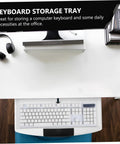 Slick Slide Out Under Desk Keyboard Tray With Heavy Duty Clamp Mount Brings Zero Clutter To Your Workspace Buttery Smooth Operation Keeps Keyboard And Mouse Drawer Gliding Effortlessly Takes Wrist Pain Off Your Plate Daily visible on a modern desk with headphones and a monitor.