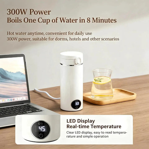 Grab And Go Travel Kettle, 500 Ml Heated Water Cup, 6 Temp Controls, 300W Fast Boil on a desk with laptop and drinks.