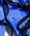 Close-up of Adjustable Lawn Aeration Shoes With Pro Grade Heavy Duty Spike Design And ABS Plastic Sole, showing blue ABS surface.