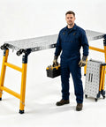 1200 Lbs Heavy Duty Folding Welding Table With Adjustable Height Solid Alloy Steel Workbench for metal fabrication shown with a man holding tools.