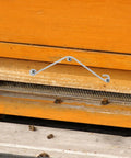 Get Your Bees Buzzing With These Sturdy 10 Pc Beehive Frame Spring Clamps And Curved Clips For Easy Beekeeping Tool Kit Setup And Fastener Jobs. Silver metal beehive frame clamp on wooden hive entrance