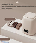 Game Changing 9L Portable Washing Machine With Spin Dryer And Clever Hidden Drain Hose, showcasing compact design and color swatches.