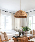 Farmhouse Rattan Pendant Light Hand Woven Seagrass Dome Chandelier in a cozy living room setting with natural materials decor.