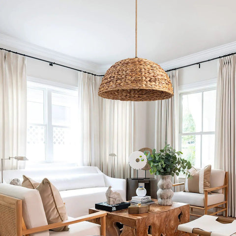 Farmhouse Rattan Pendant Light Hand Woven Seagrass Dome Chandelier in a cozy living room setting with natural materials decor.