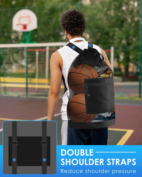 Person carrying Beast Size Soccer Ball Bag With Dual Shoulder Straps And Top Handle Heavy Duty Mesh Gear Tote on a basketball court