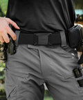 Man wearing Mens Stretch Tactical Belt With 1.5 Inch Elastic Nylon Webbing And Flip Quick Release Buckle for outdoor