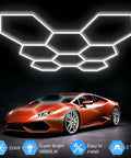 Hexagon Garage Light With Ultra Bright 38880 Lumen Output, 6500K Daylight White fixture, installed above a sports car
