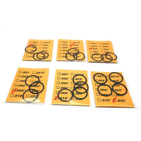 Black Coated 5/8x24 Barrel Shim Kit For.308 7.62mm 300 BLK Barrels, Stainless Steel Shims, 20 Pack, Multi Thickness Set For Quick Dial-In And Precise Alignment packaging with different shim thicknesses visible