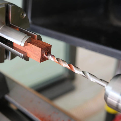 Pen Mandrel Saver Universal Barrel Trimming System Pen Tube Insertion Tool Kit in use with wood block and 7mm drill bit