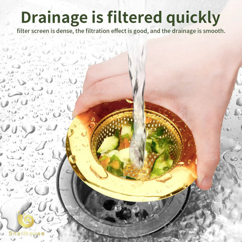 Hand holding Two Pack Stainless Steel Kitchen Sink Strainers With Gold Finish, 4.5 Inch Wide Rim, Mesh Drain Basket Food Catcher