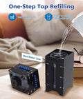 DIY Humidifier Soldering Kit With Time And Humidity Settings OLED Display And LED Light Modes Desktop Electronics Project with water being poured into it