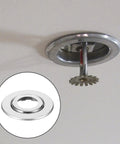 30 Pcs Stainless Steel Fire Sprinkler Cover Plates With Slick Silver Dual Disc Design, ceiling installation view showing sprinkler head.