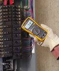 Electrician using Digital Multimeter With Non Contact Voltage Detection VoltAlert Technology AutoVolt Automatic AC And DC Voltage Selection