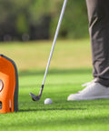Launch Pro Circle B Edition Launch Monitor With Golf Course GPS Overview on grass with golfer preparing to swing.