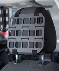 Beefy Car Headrest MOLLE Panel Organizer with quick install webbing on SUV seat, shown in black ABS material.