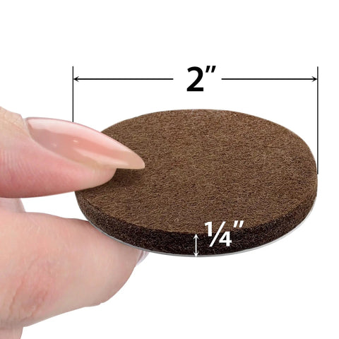 Heavy-Duty Round Felt Furniture Pads 2 Inch Thick One Quarter Inch Protectors For Furniture Feet, brown felt pad in hand