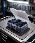 Top Notch 53 Piece Pneumatic Fitting Bundle With Quick Connect Push To Air Hose Links In 1/4 3/8 And 1/2 Inch Sizes Featuring Sturdy Zinc Alloy Elbows Tees And Straight Adapters For Heavy Duty Industrial Plumbing Jobs That Need Zero Leaks And Serious. Open plastic case with assorted pneumatic push fittings on workbench