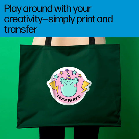 Person holding tote bag with a design created using Light Fabric Iron On Transfers 8.5 By 11 Inches Pack Of 20 Sheets for DIY projects