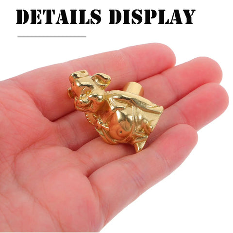 Hand holding Vintage Brass Pig Shaped Drawer Pulls Chinese Style Decorative Cabinet Handles For Small Drawers Dressers Wardrobes And Storage Boxes Retro Hardware With Easy Maintain Shine