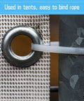 Close-up of a durable grommet on tarp secured with a zip tie, part of 25 Sets 1 Inch Grommets And Eyelets Kit With Washers Self Backing