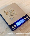 Platinum XP500 Pro Grade Jeweler Pocket Scale for Quick Gold and Silver Weighing, displaying 10.45g with jewelry on scale