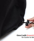 Close-up of hand adjusting drawstring on Waterproof Outdoor Pizza Oven Cover For Ninja OO101 Woodfire 8 In 1 Oven with elastic bands.