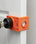 Pro Grade Door Lock Installation Kit With Adjustable Guide Template and Heavy Duty Hole Saws in use on a white door.