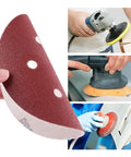 130 Piece Pro Grade 6 Inch Sanding Discs Set with 6 Hole Pattern in use with random orbital sander for smooth finishes.