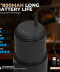 Portable All-In-One Coffee Maker With Built-In Battery And Grinder, close-up view with USB-C charging cable connected.