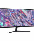 Side view of 34 Inch Ultra WQHD Ultrawide Monitor With 100Hz Refresh, 5ms Response, HDR10, AMD FreeSync, Eye Care, Borderless Design, PIP PBP, 21 By 9 Desktop Multitasking For Gaming And Work, Black on stand