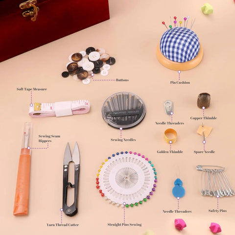 Handheld Sewing Machine With Elegant Wooden Box And 153 Piece Kit accessories including needles, tapes, scissors, and buttons.