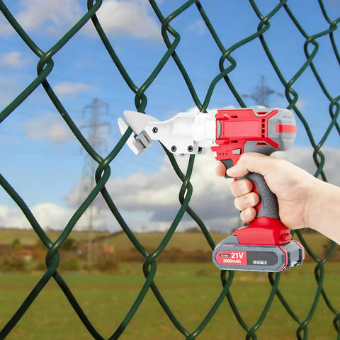 Brilliant 21V Cordless Shear For Sheet Metal Heavy Duty Electric Cutter cutting through a green chain-link fence.