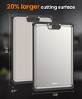 Dual-sided kitchen cutting board with stainless steel and wheat straw surfaces, 16.9 x 11.8 in.
