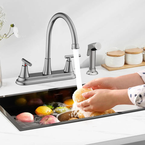 Swanky Two Handle Kitchen Faucet With Pull Out Side Sprayer And Tall High Rise Arc Finished In Brushed Nickel for cleaning fruits.