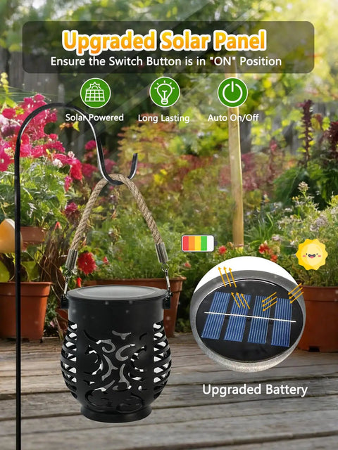 Four Pack Solar Lanterns With Flickering Flame, Outdoor Waterproof Hanging Lights, in garden with solar charging panel detail