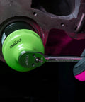 76 Millimeter 14 Flute Oil Filter Wrench for Easy Oil Changes Reinforced Three Eighths Inch Drive in use on engine