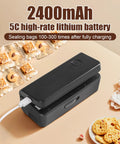 Pocket Size Bag Sealer with USB 1300mAh Rechargeable Battery, LED Power Display, sealing gears, and cutter on table with snacks.