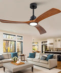 52 Inch Wood Ceiling Fan With 3 Solid Wood Blades Reversible DC Motor For Living Room in modern home setting with light on.