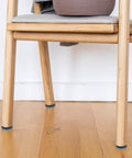 Chair with PTFE And Iron Furniture Sliders Set 16 Pieces Easy Glide Chair Protectors on hardwood floor