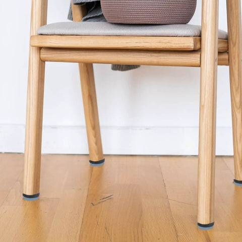 Chair legs with 16 Pack Furniture Sliders Chair Glides For Hardwood Floors And Carpet, PTFE And Iron Floor Protectors installed